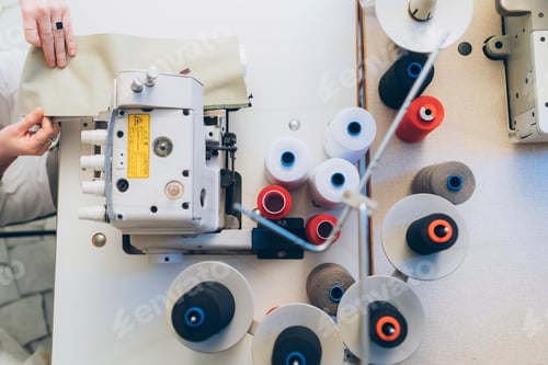 Preview: Woman working at sewing machine