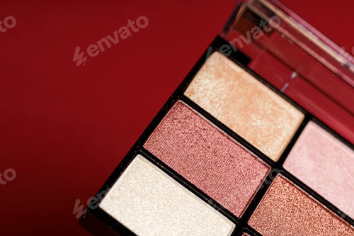 Preview: Makeup eyeshadow palette on the red background