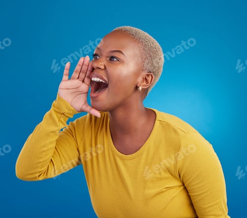 Preview: Shouting, announcement and loud with a black woman on a blue background in studio for news or commu