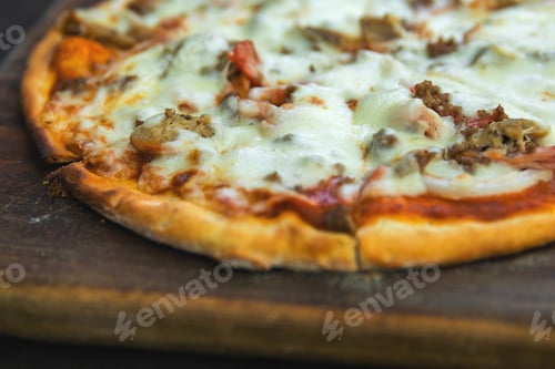 Preview: Delicious pizza with mozzarella cheese, minced meat and bacon