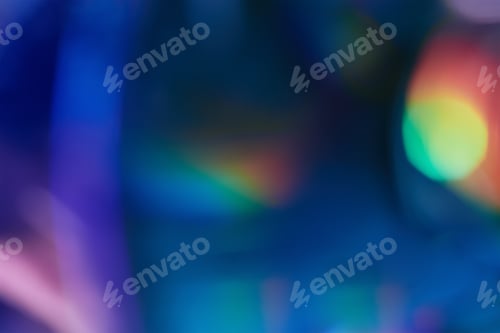 Preview: Blurred rainbow colored light flare background.
