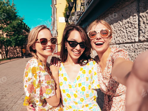 Preview: Three beautiful women posing outdoors