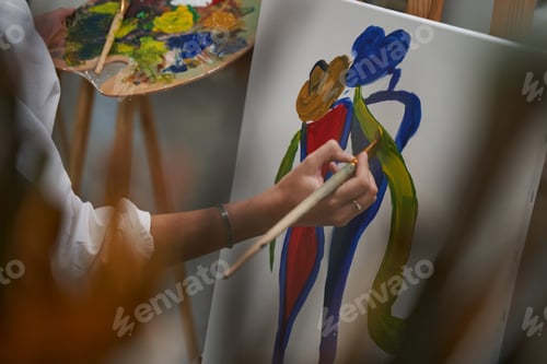 Preview: Close up of female hand using natural art brush