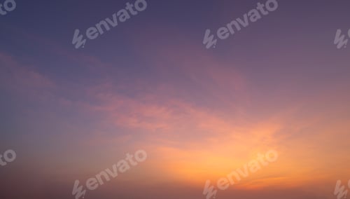 Preview: Sunset sky. Abstract nature background. Dramatic blue and orange, colorful clouds at twilight time.