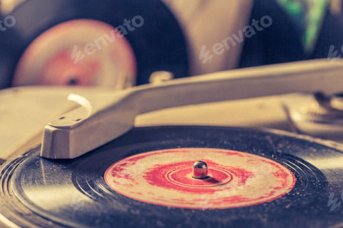 Preview: Classic record player and old vinyls with scratched