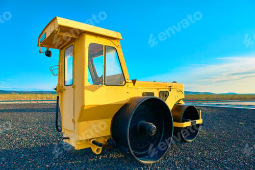 Preview: Road construction heavy equipment on the site on a sunny day
