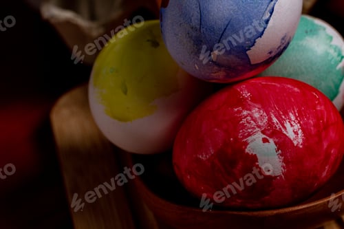 Preview: Set of painted Easter eggs in container on table