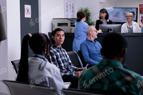 Preview: Portrait of asian patient waiting for doctor appointment in private hospital while doctor is talking
