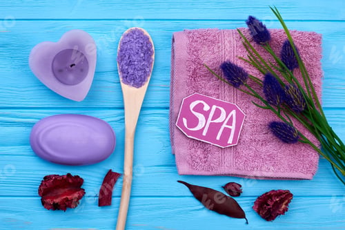 Preview: Flat lay spa bathroom aromatic accessories on blue wood.