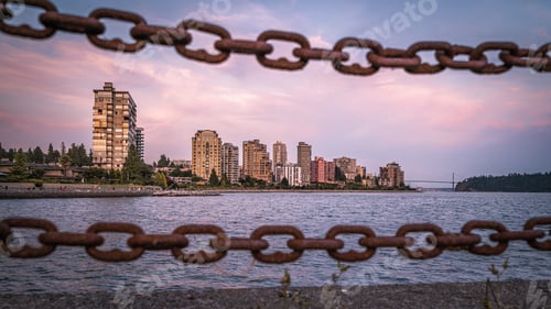 Preview: Beautiful view of residential buildings on the Pacific Ocean Coast during sunset