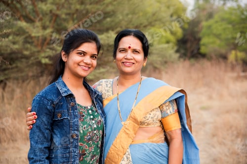 Preview: Happy loving mother and daughter at outdoor