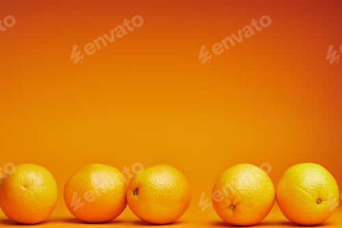 Preview: close-up view of fresh ripe oranges on orange background