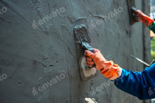 Preview: man is painting wall with trowel