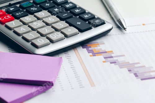 Preview: Business still life with calculator on table in office