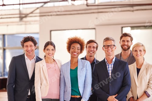 Preview: The number one team in the business. Cropped portrait of businesspeople standing in an office.