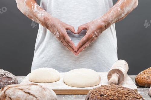 Preview: Baker preparing delicious fresh bread and pastry