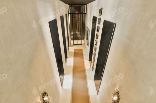 Preview: a view down a hallway with mirrors on the wall
