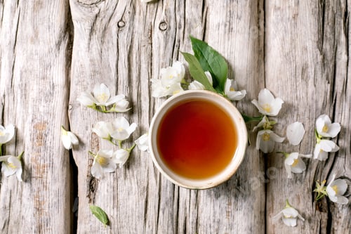 Preview: Tea Cup White Flowers Wooden Background