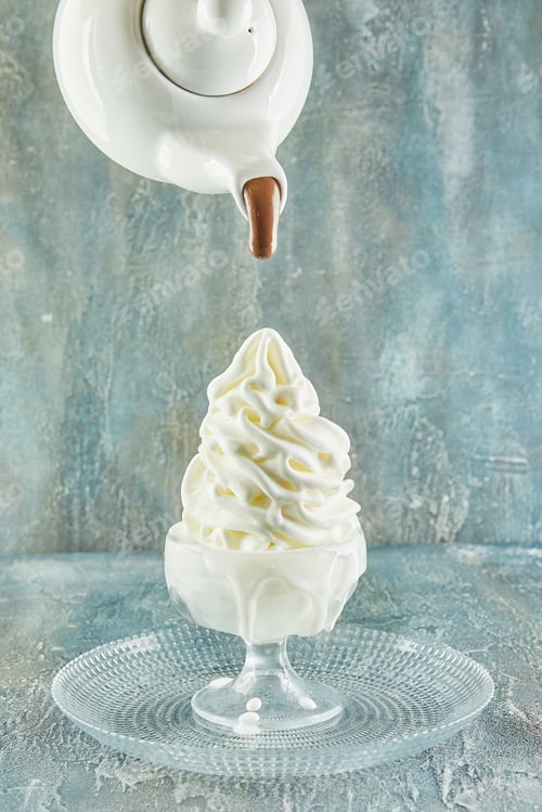 Preview: Liquid chocolate paint drizzled over whipped cream like a feather painting