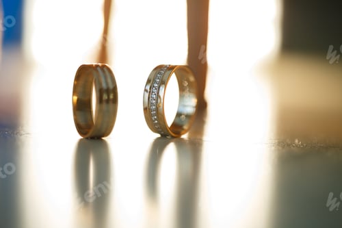 Preview: Gold wedding rings for newlyweds on wedding day