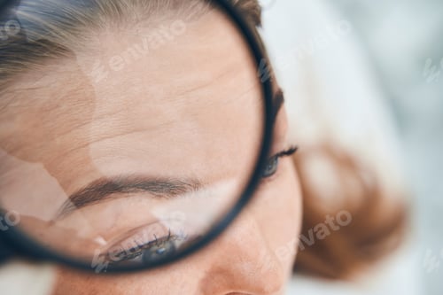 Preview: Competent medical worker checking quality of facial skin