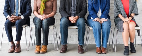 Preview: Professionals Seated at an Office Job Interview