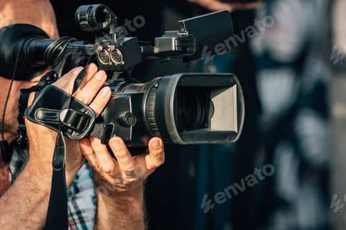 Preview: Cameras at a Press Conference Outdoors