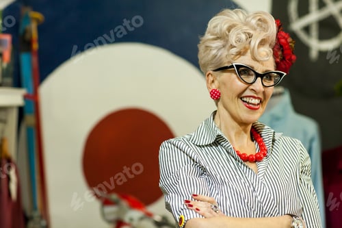 Preview: Portrait of quirky vintage woman in antique and vintage emporium
