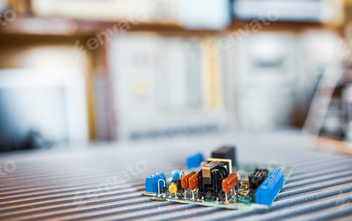 Preview: Microcircuits and components lie on metal plates