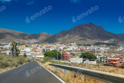 Preview: A scenic view of San Miguel in Tenerife, a town nestled in a valley with mountains in the background