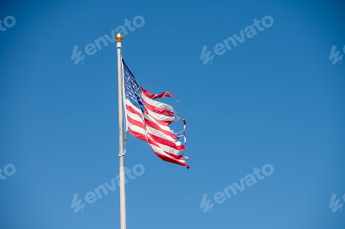 Preview: Tattered American flag seen on pole