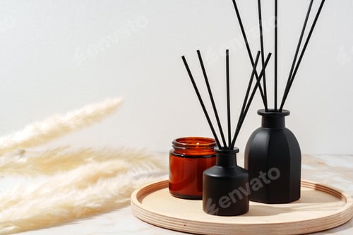Preview: Black Reed Diffuser and Amber Candle on Wooden Tray