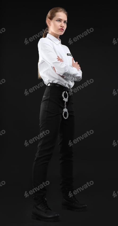 Preview: Female security guard in uniform on dark background