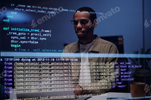 Preview: Analyzing Code on Computer Screen in Dark Office