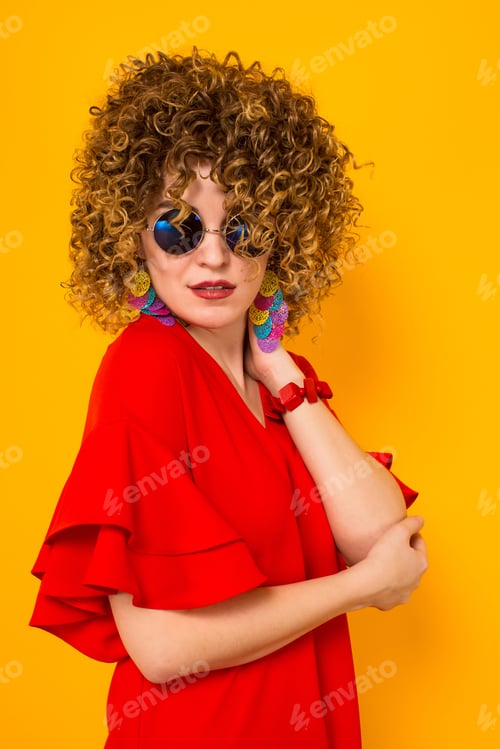 Preview: Attractive woman with short curly hair