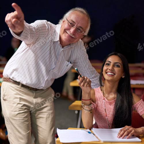 Preview: Ah, I get it now. Shot of a beautiful university student getting help from a lecturer in class.