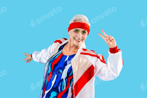 Preview: Happy and funny senior old woman on colorful background