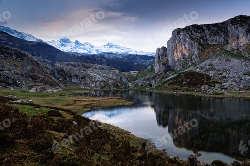 Preview: View of the Lake Ercina against snowcapped mountains in the lakes of Covadonga in Asturias