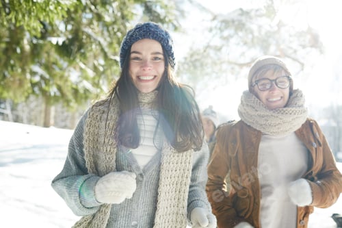 Preview: Two Young Women in Winter Forest