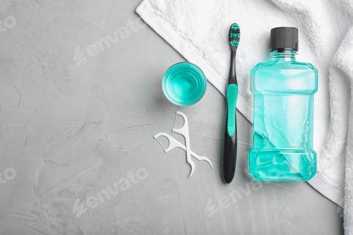 Preview: Flat lay composition with oral care products and space for text on light background. Teeth hygiene