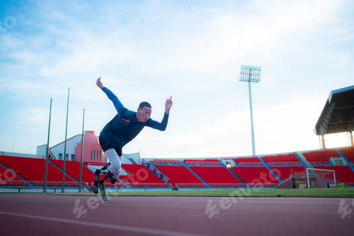 Preview: Disabled athletes prepare in starting position ready to run on stadium track