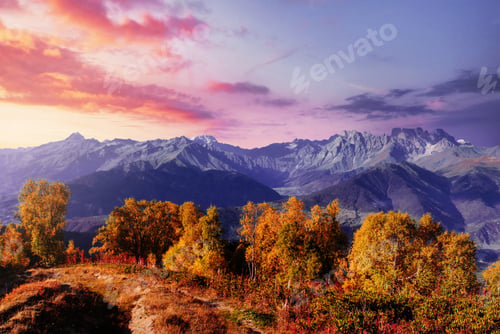 Preview: Autumn landscape and snow mountains in beautiful cumulus clouds. Main Caucasian Ridge. Type Mount