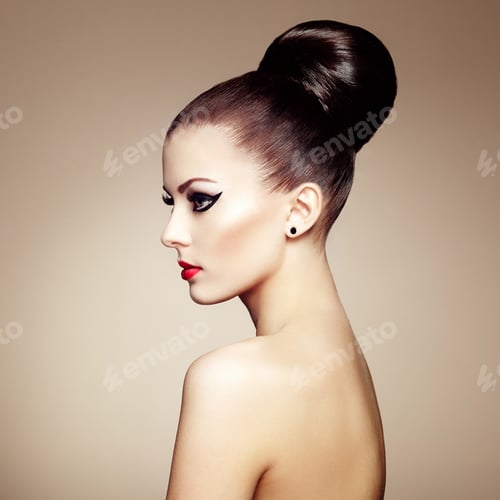 Preview: Woman with dark hair in an updo style
