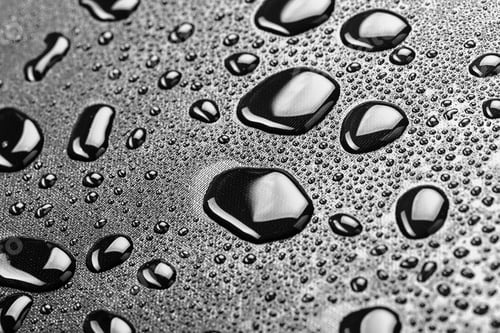 Preview: water drops splash on the black floor
