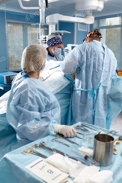 Preview: Surgeons Performing Operation in Operating Room Setting
