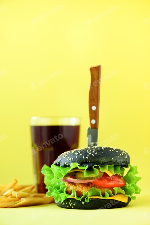 Preview: Fast food banner. Juicy meat burgers with cheese, lettuce on yellow background. Take away meal