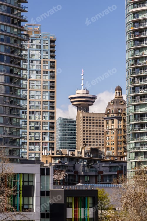 Preview: Modern Vancouver Skyline Featuring Iconic Lookout Tower in a Sunny Urban Setting
