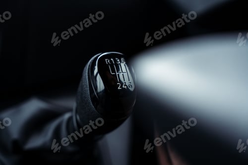 Preview: Car manual gear stick situated inside a vehicle dashboard