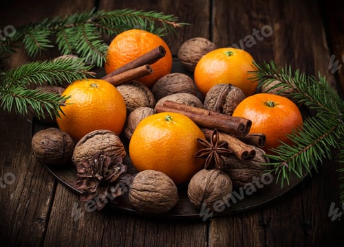 Preview: Christmas composition with tangerines, nuts and cinnamon