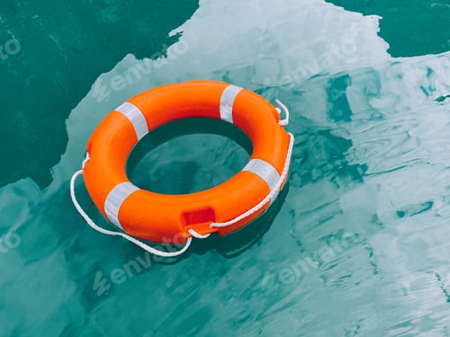 Preview: Lifebuoy on turquoise water
